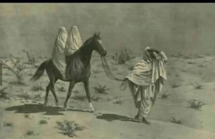 Man without shoes woman riding with shoes.